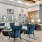 a room with chairs and tables