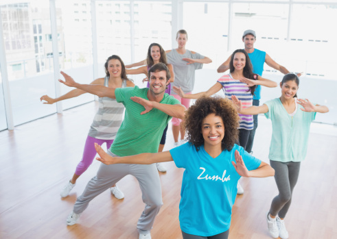 Dance class with arms up